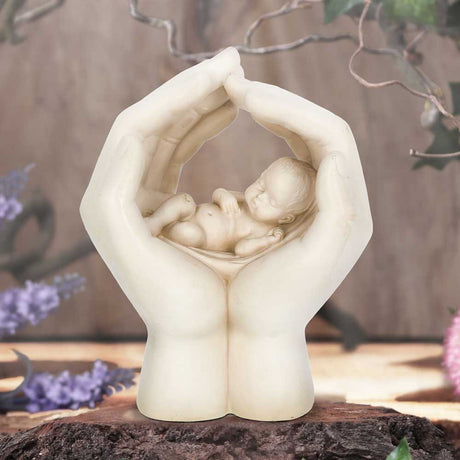 Large Shelter 17.5cm Baby in Cradled Hand Figurine - Figures & Collectables at Gift Moments